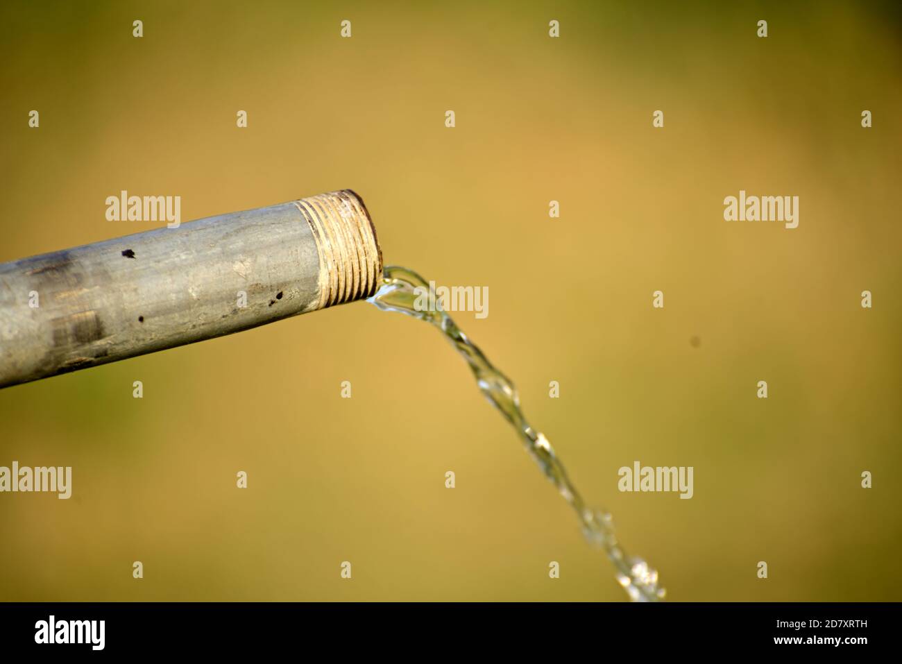 Fresh water flowing out from a steel pipe Stock Photo Alamy