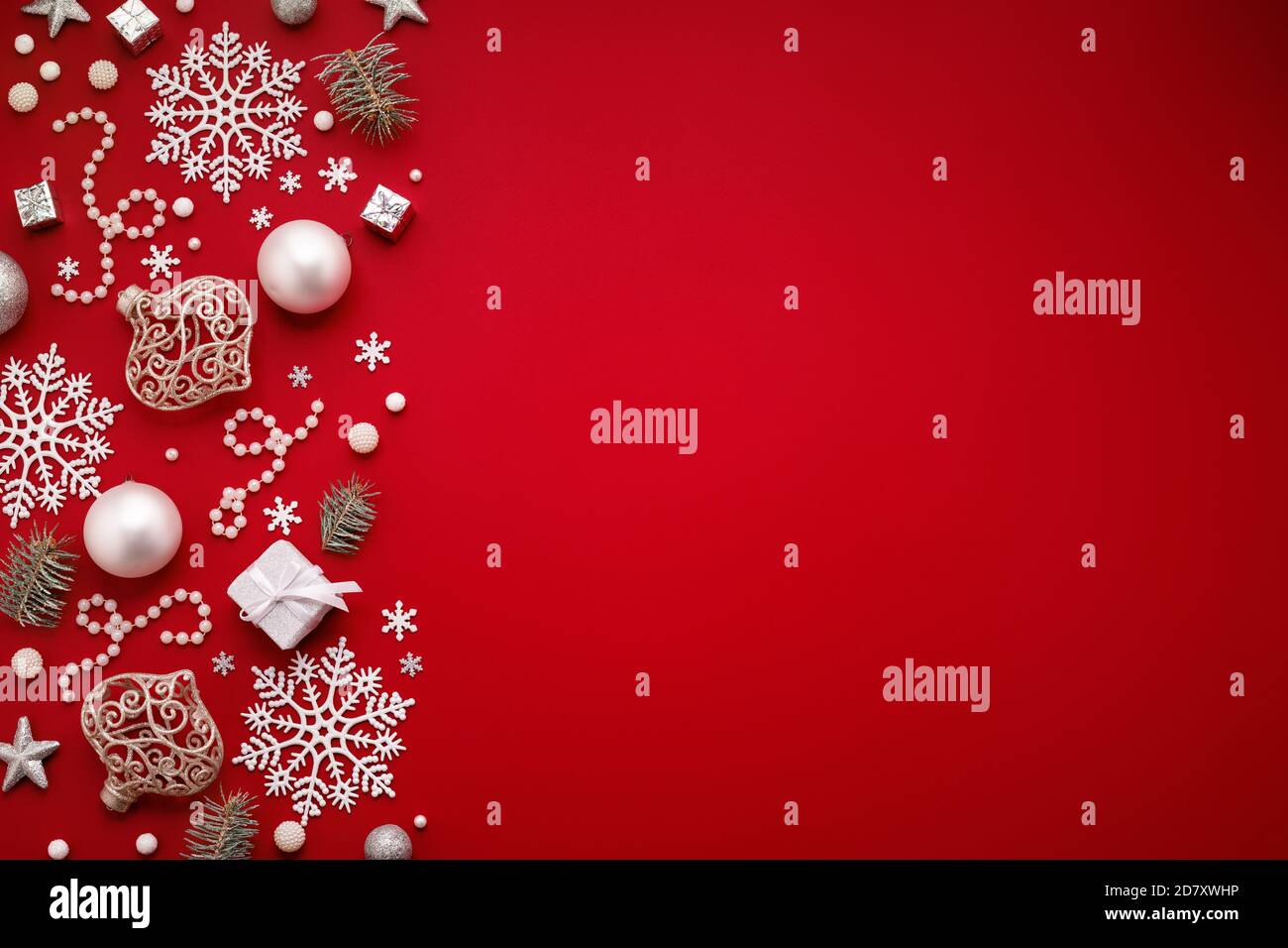 https://c8.alamy.com/comp/2D7XWHP/christmas-background-with-white-decorations-border-on-red-copy-space-christmas-ornaments-flat-lay-2D7XWHP.jpg