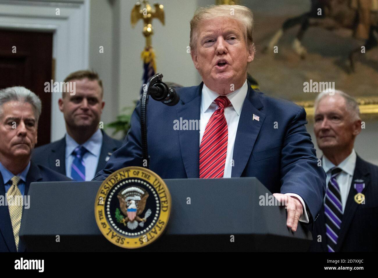 President Donald Trump delivers remarks prior to signing an Executive Order entitled  'National Roadmap to Empower Veterans and End Suicide' in the Roosevelt Room of the White House in Washington, D.C. on March 5, 2019. While answering questions after the signing, Trump told reporters, 'The witch hunt continues,' referring to Congressional Democrats efforts to investigate the Presidents' son in law, and Presidential Advisor Jared Kuschner. Credit: Alex Edelman/The Photo Access Stock Photo