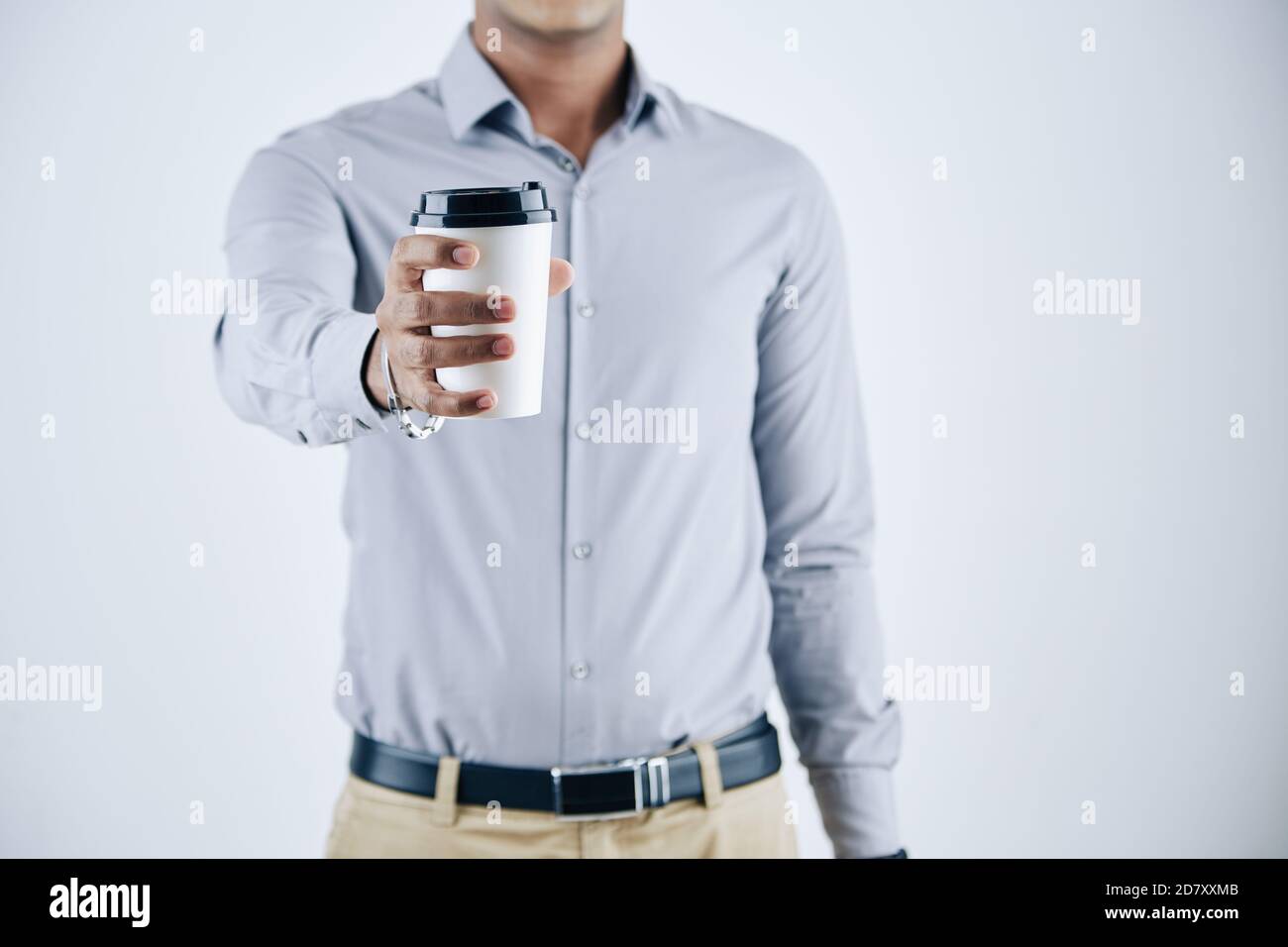 Businessman giving coffee Stock Photo