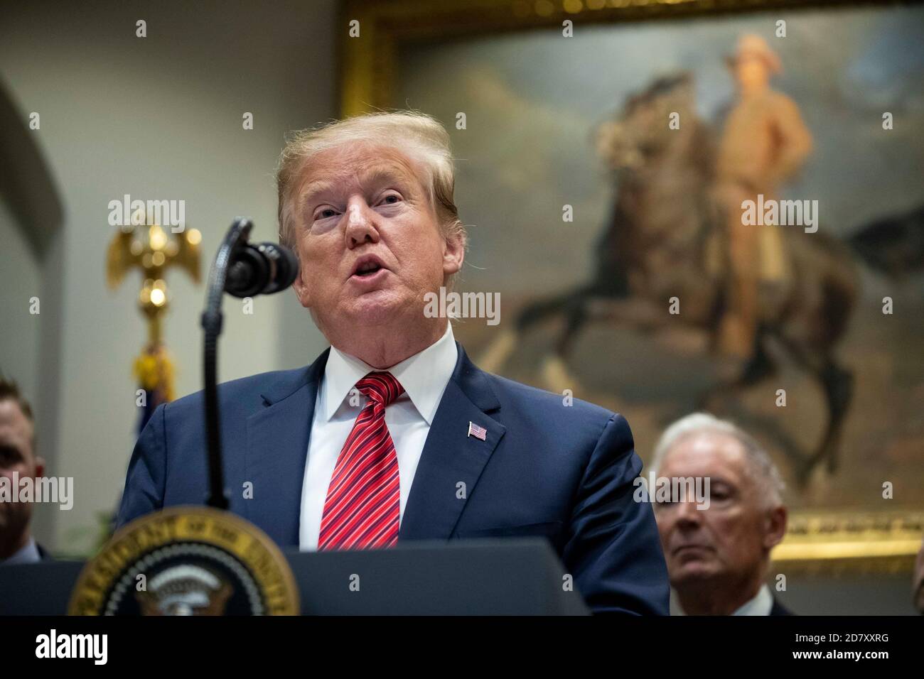 President Donald Trump delivers remarks prior to signing an Executive Order entitled  'National Roadmap to Empower Veterans and End Suicide' in the Roosevelt Room of the White House in Washington, D.C. on March 5, 2019. While answering questions after the signing, Trump told reporters, 'The witch hunt continues,' referring to Congressional Democrats efforts to investigate the Presidents' son in law, and Presidential Advisor Jared Kuschner. Credit: Alex Edelman/The Photo Access Stock Photo