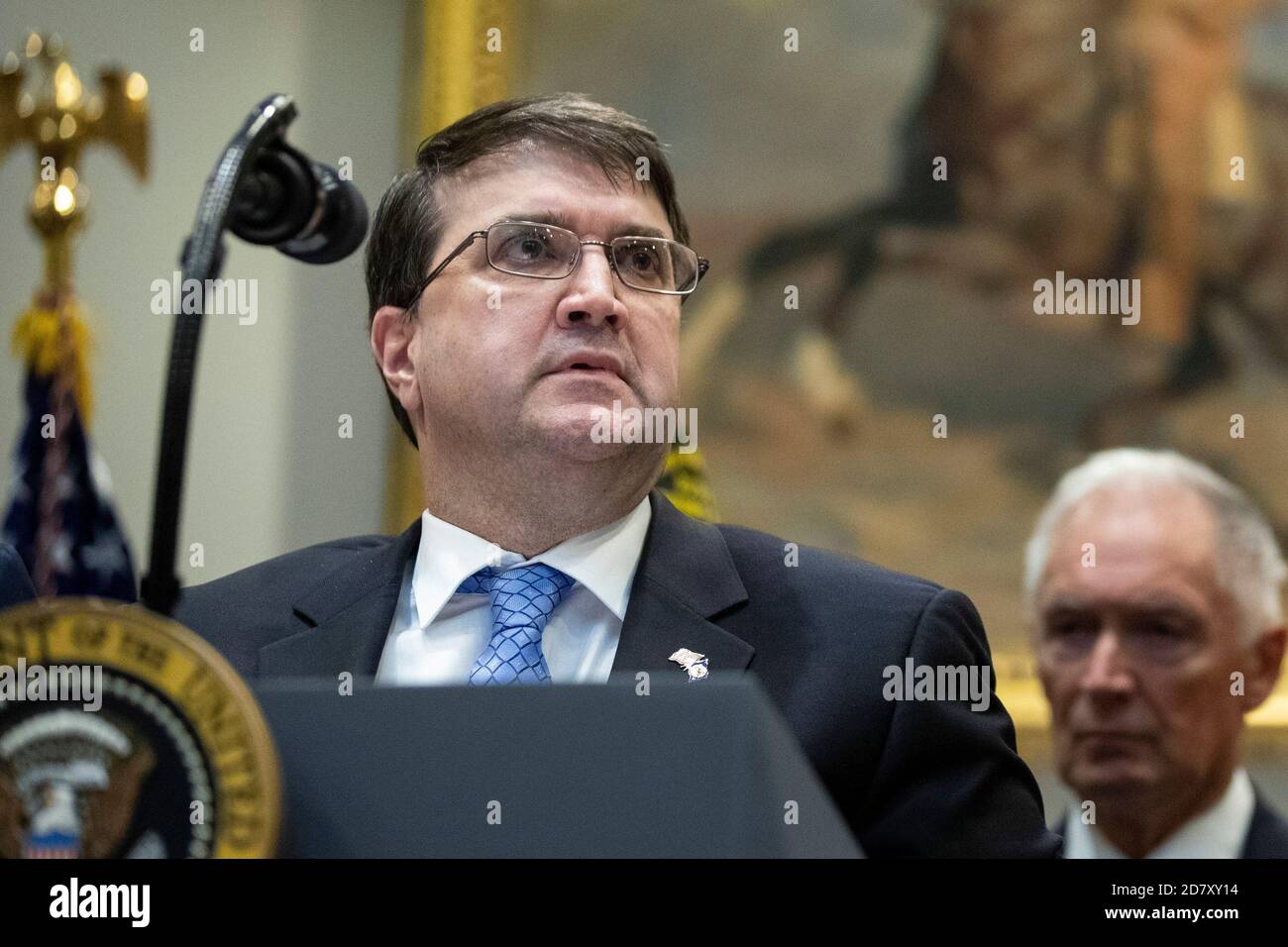 Secretary of the Department of Veterans Affairs Robert Wilkie speaks before President Donald Trump signs an Executive Order entitled  'National Roadmap to Empower Veterans and End Suicide' in the Roosevelt Room of the White House in Washington, D.C. on March 5, 2019. While answering questions after the signing, Trump told reporters, 'The witch hunt continues,' referring to Congressional Democrats efforts to investigate the Presidents' son in law, and Presidential Advisor Jared Kuschner. Credit: Alex Edelman/The Photo Access Stock Photo