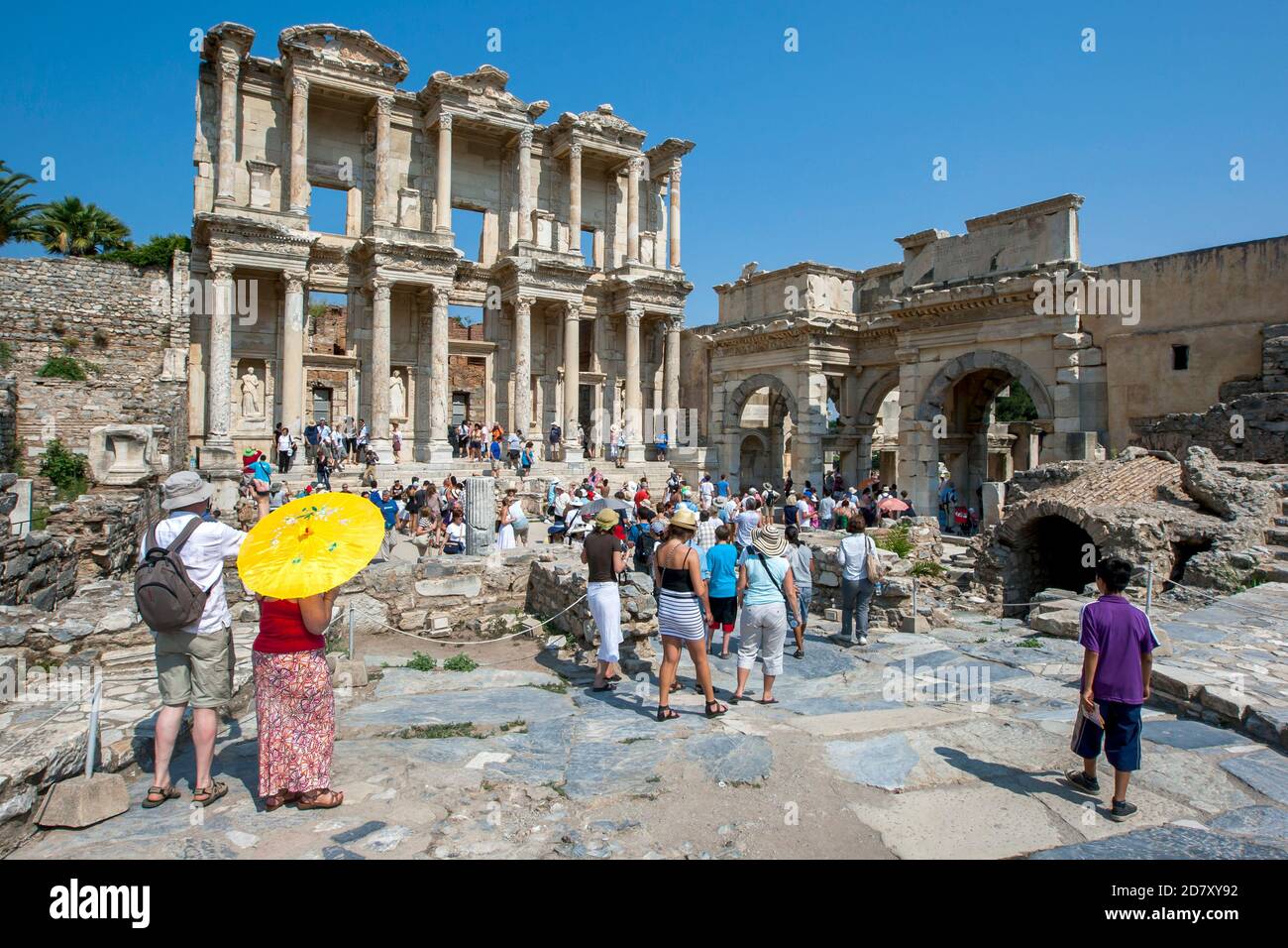 Celcus Tourists crowd around the Library of Celcus at the ancient site of ...