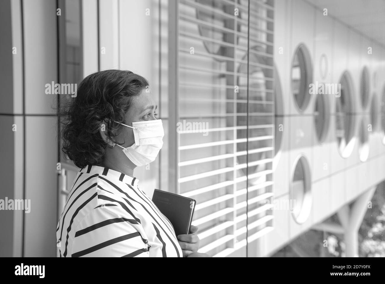 Asian woman wearing mask Black and White Stock Photos & Images - Alamy