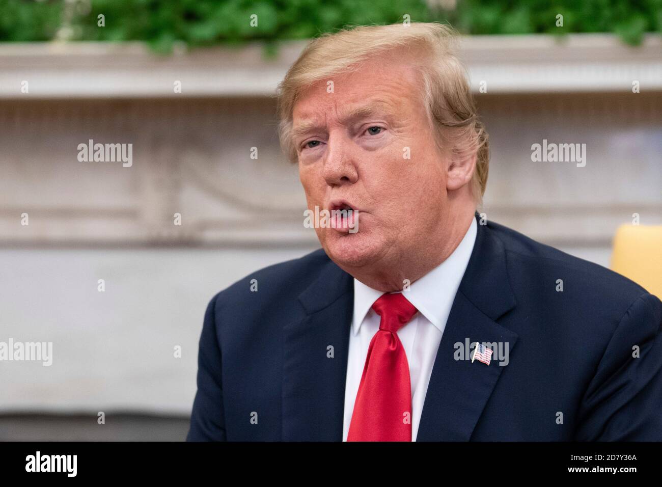 U.S. President Donald Trump talks to the Prime Minister of the Czech Republic Andrej Babiš during an Oval Office meeting with their wives' Monika Babišová and First Lady Melania Trump at the White House in Washington, D.C. on March 7, 2019. Credit: Alex Edelman/The Photo Access Stock Photo