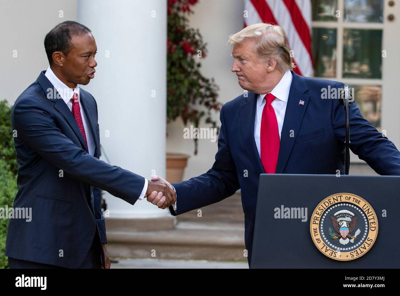 U.S. President Donald Trump shakes hands with Golfer Tiger Woods before presenting Woods with the Presidential Medal of Freedom in the Rose Garden of the White House in Washington, D.C. on Monday, May 6, 2019. The Presidential Medal of Freedom is the highest honor a U.S. President can bestow on a civilian. Credit: Alex Edelman/The Photo Access Stock Photo