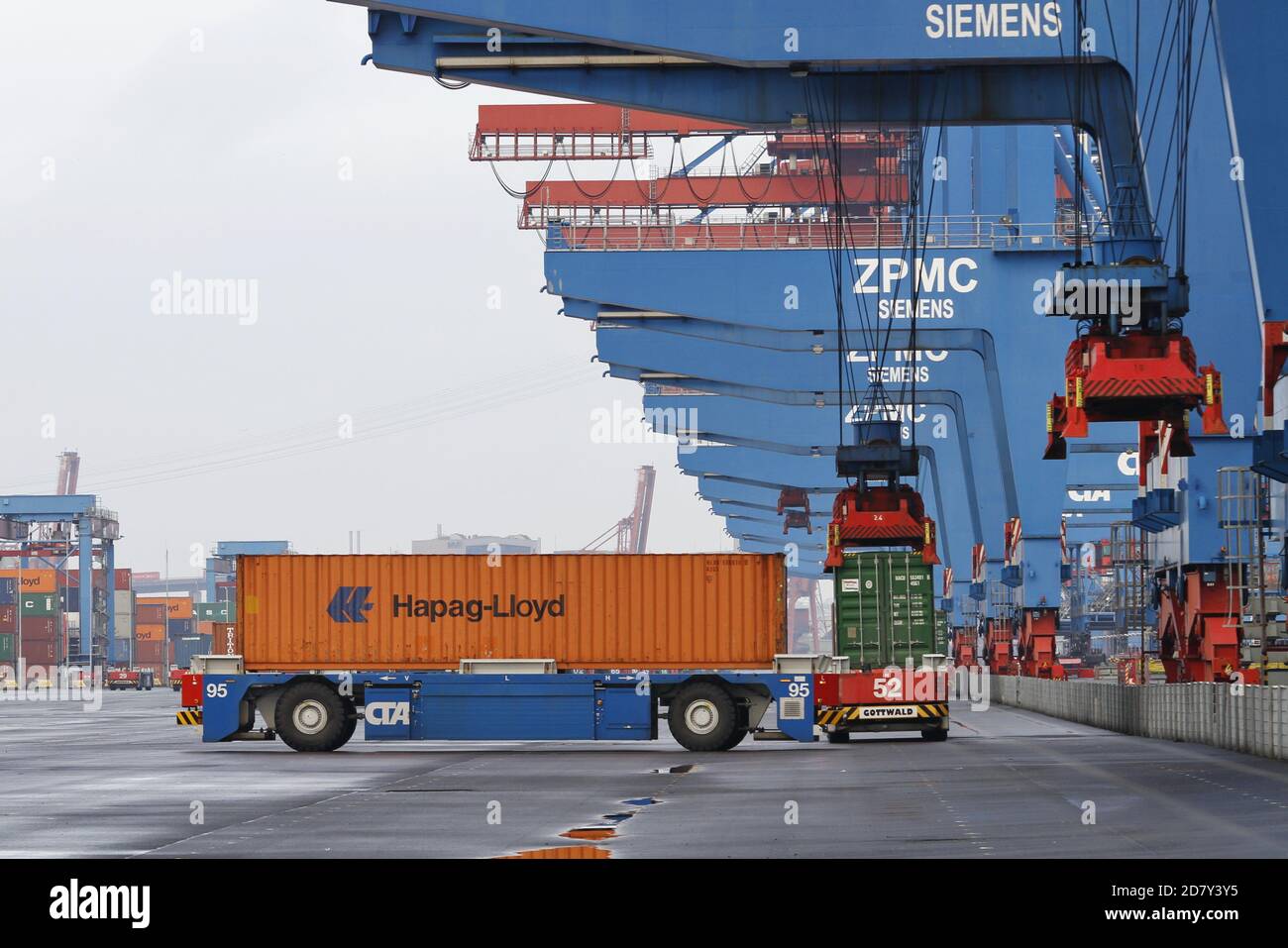 Cranes And Automatic Container Transport System At Hhla Container Terminal Altenwerder In The Port Of Hamburg Germany Stock Photo Alamy