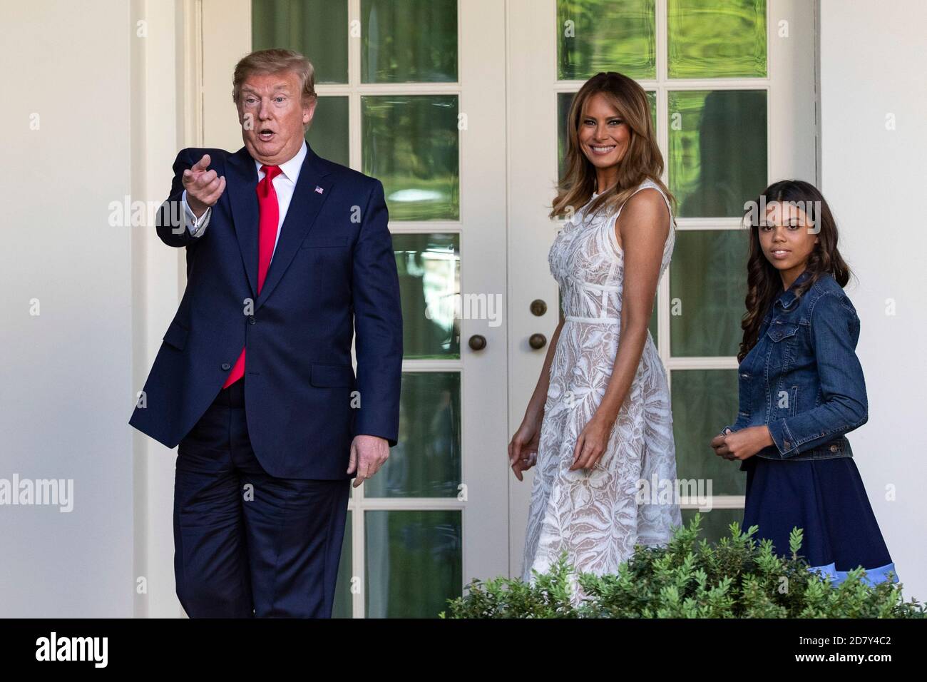 U.S. President Donald Trump gestures to the family of golfer Tiger Woods while First Lady Melania Trump and Woods's daughter Sam follow him into the Oval Office following a ceremony in the Rose Garden of the White House in Washington, D.C. on Monday, May 6, 2019. During the ceremony, Trump awarded Woods the Presidential Medal of Freedom to Woods.The Presidential Medal of Freedom is the highest honor a U.S. President can bestow on a civilian. Woods is the fourth golfer to receive the award. Credit: Alex Edelman/The Photo Access Stock Photo