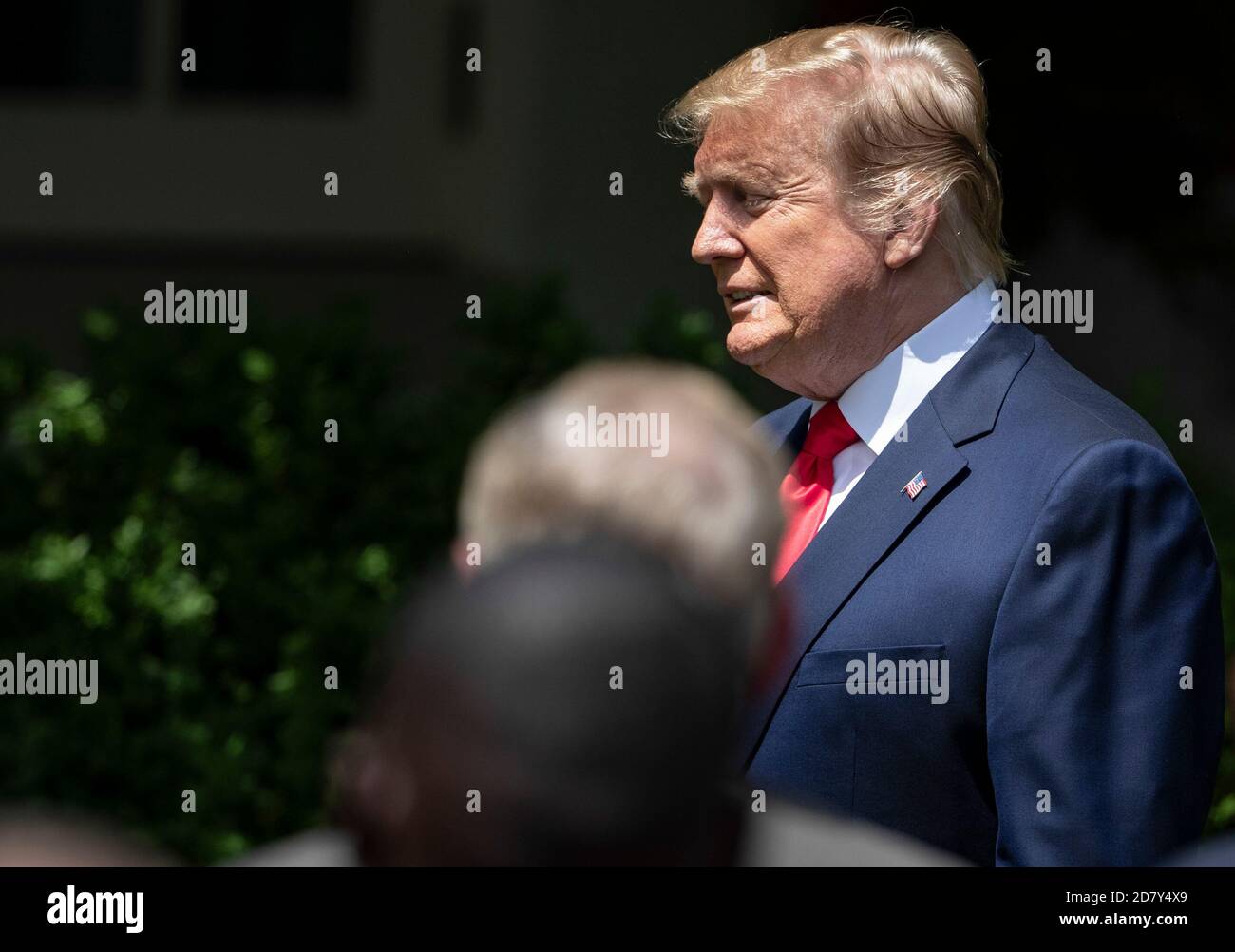 U.S. President Donald Trump enters the rose garden before delivering ...