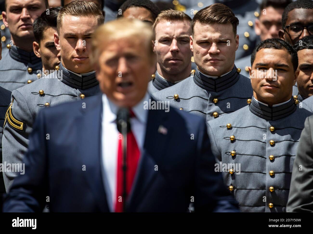 Cadets from the U.S. Military Academy look on U.S. President Donald Trump delivers remarks prior to presenting the Commander-in-Chief’s trophy to the team in the White House Rose Garden in Washington, D.C. on Monday, May 6, 2019. Credit: Alex Edelman/The Photo Access Stock Photo