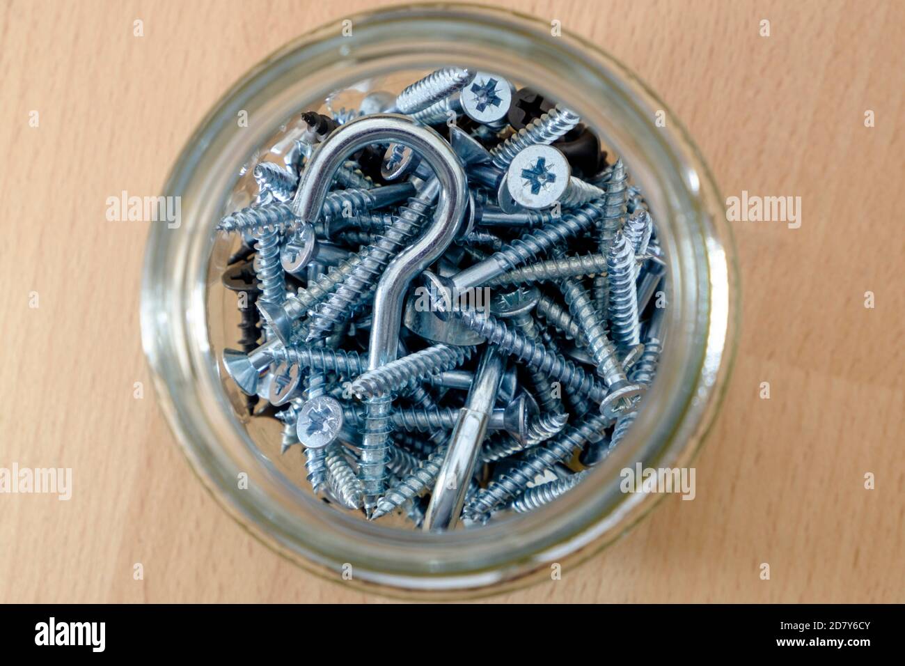 A jar full of screws; odds and ends Stock Photo Alamy