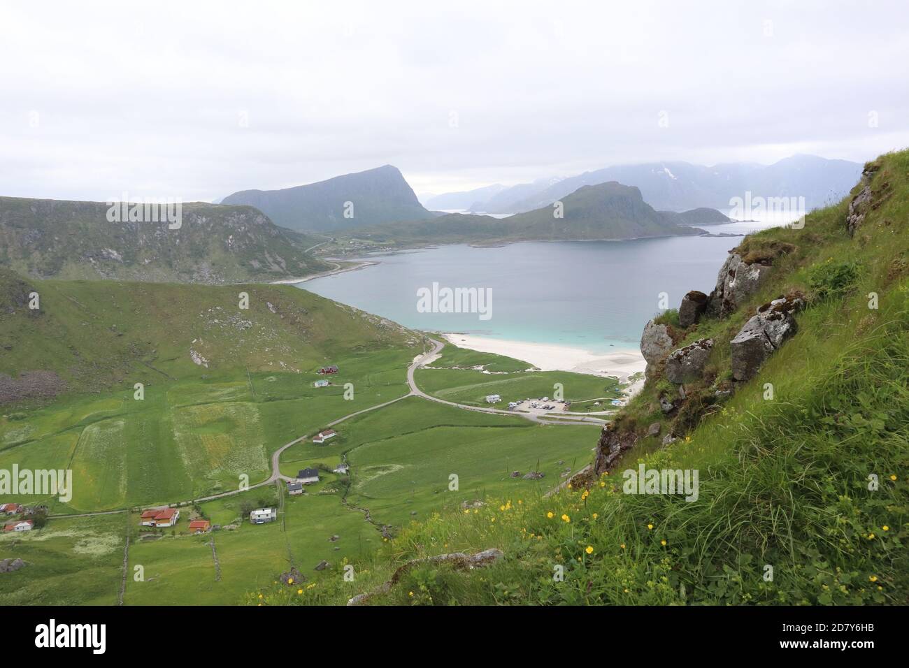 Leknes / Norway - June 17 2019: View from the mountains onto Haukland Beach Stock Photo