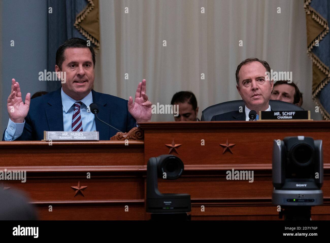 Rep. Devin Nunes, R-C.A., left, asks a witness a question while committee Chairman Rep. Adam Schiff, D-C.A., listens during a House (select) Intelligence Committee Hearing on Mueller report implications  on Capitol Hill in Washington, D.C. on June 12, 2019. Credit: Alex Edelman/The Photo Access Stock Photo