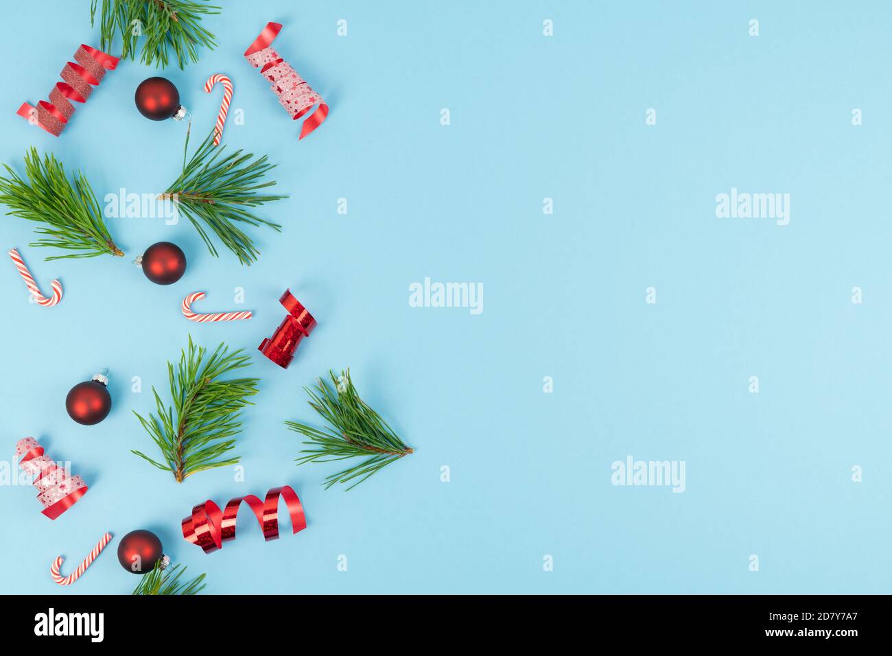 Various Christmas decorations on a blue background. Copy space. Stock Photo