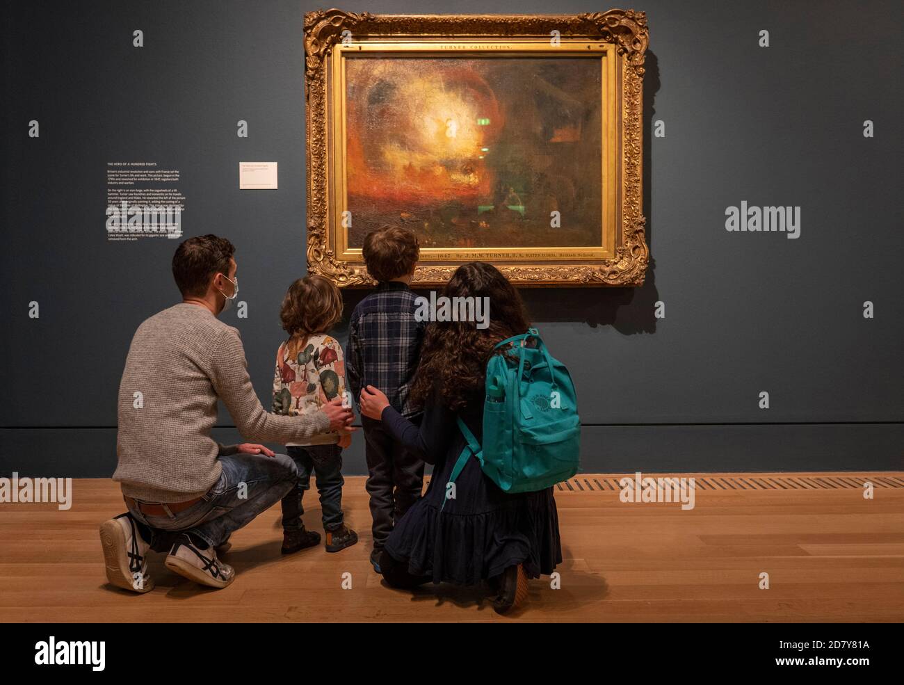 London, England. 26th October 2020. A family looking at Turner’s The Hero of a Hundred Fights oil on canvas painting during the press viewing of Turner’s Modern World at the Tate Britain. Opening on the 28th October 2020, its a major exhibition is dedicated to JMW Turner (1775-1851). Turner’s Modern World reveals how the British landscape painter found new ways to capture daily events, from technology’s impact on the natural world to the effects of modernisation on society. (photo by Sam Mellish / Alamy Live News) Stock Photo