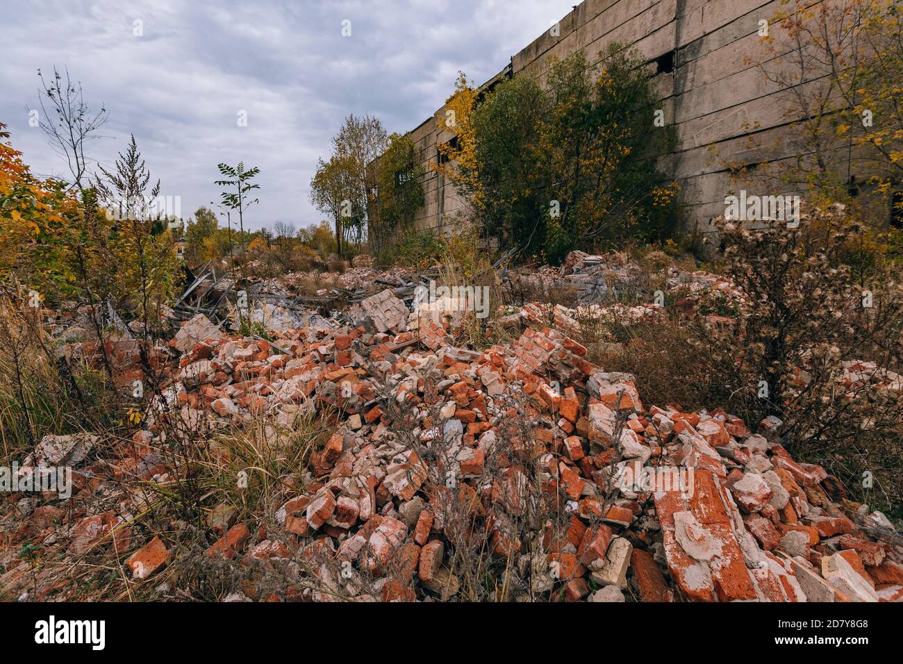Detroyed Stack Rocks Remains of demolished old industrial building. Pile of stones, bricks ...