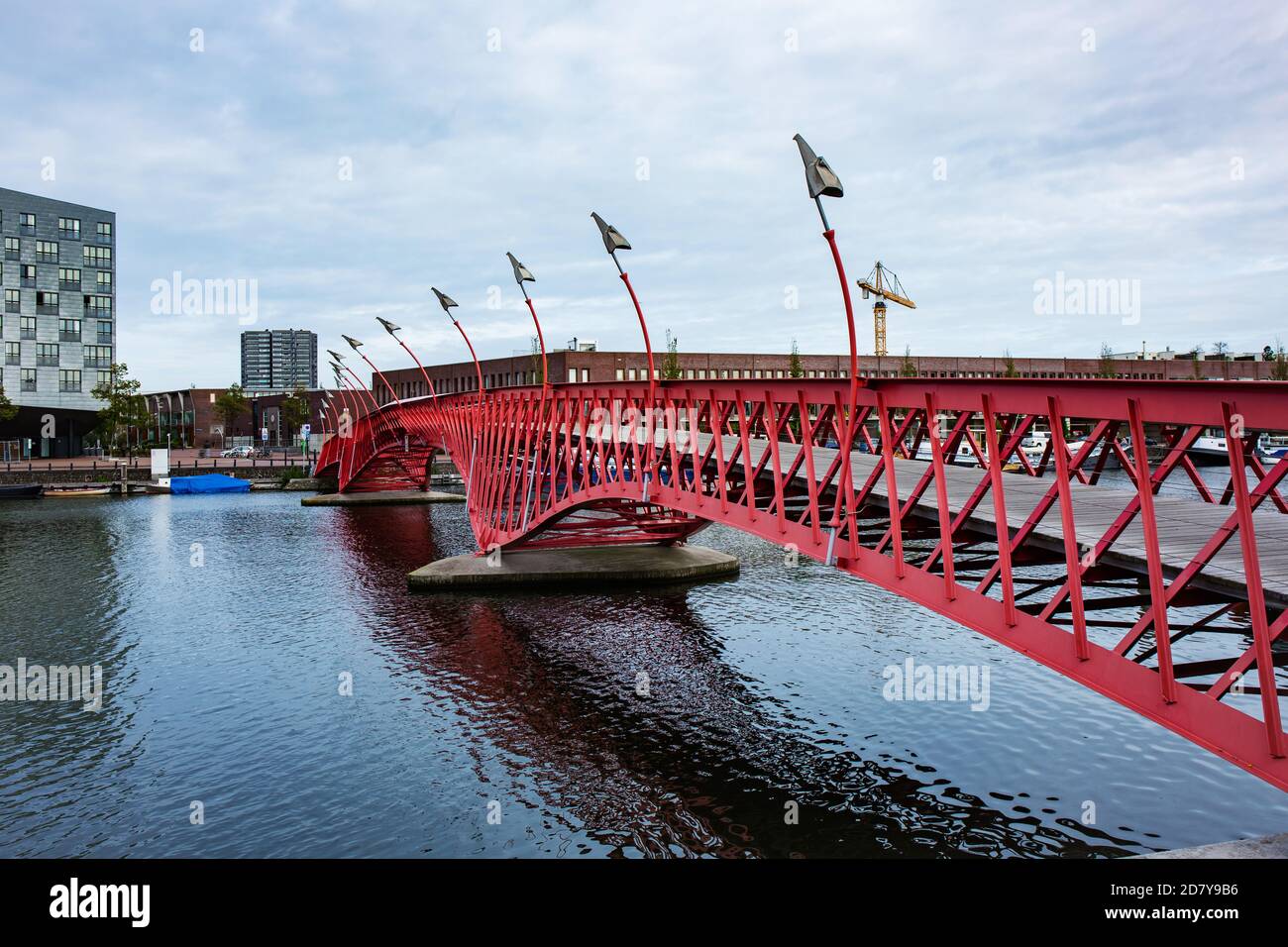 Red Python bridge in Amsterdam, Netherlands Stock Photo - Alamy