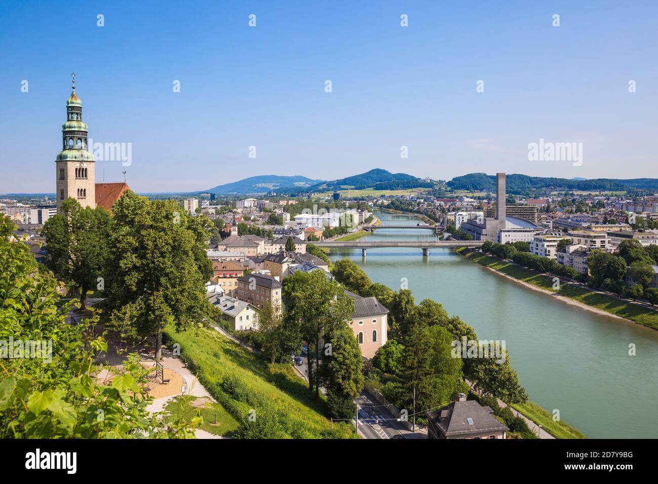 Austria, Salzburg, View of Salzach river, on the left is the former Augustinerkloster. founded for Augustinian hermits in 1605 Stock Photo