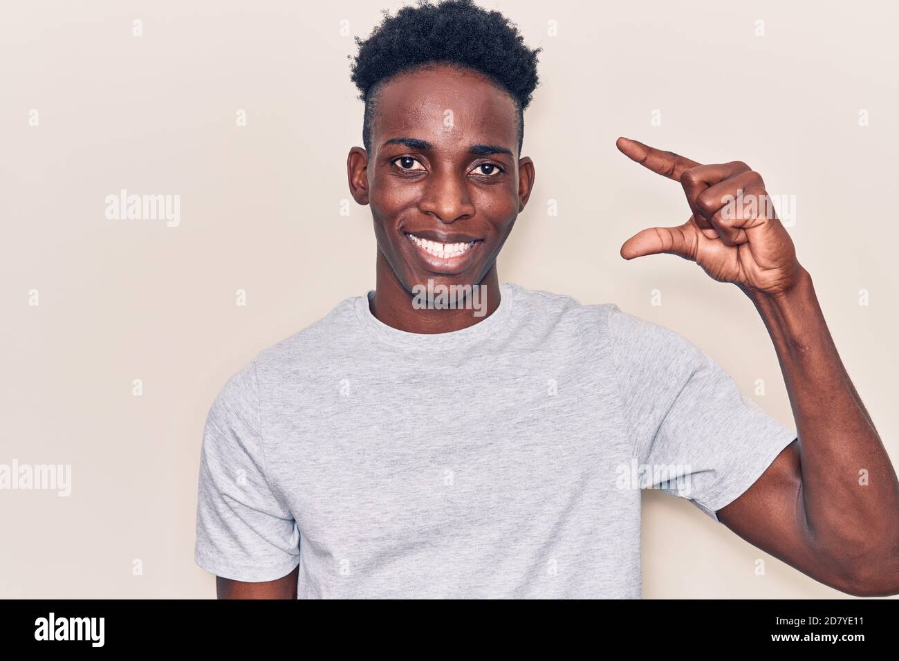 Young african american man wearing casual clothes smiling and confident ...