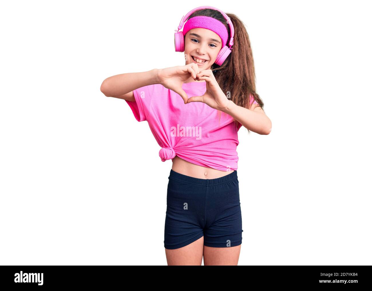 Beautiful little girl in workout clothes Stock Photo - Alamy