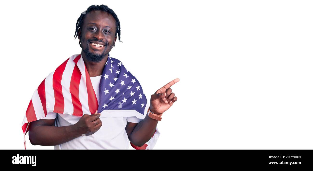 Young african american man with braids wearing united states flag ...