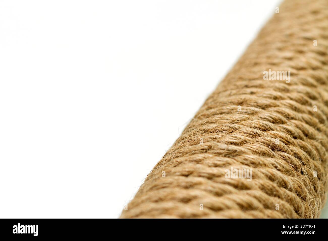 macro closeup sisal rope cat scratching post on white background