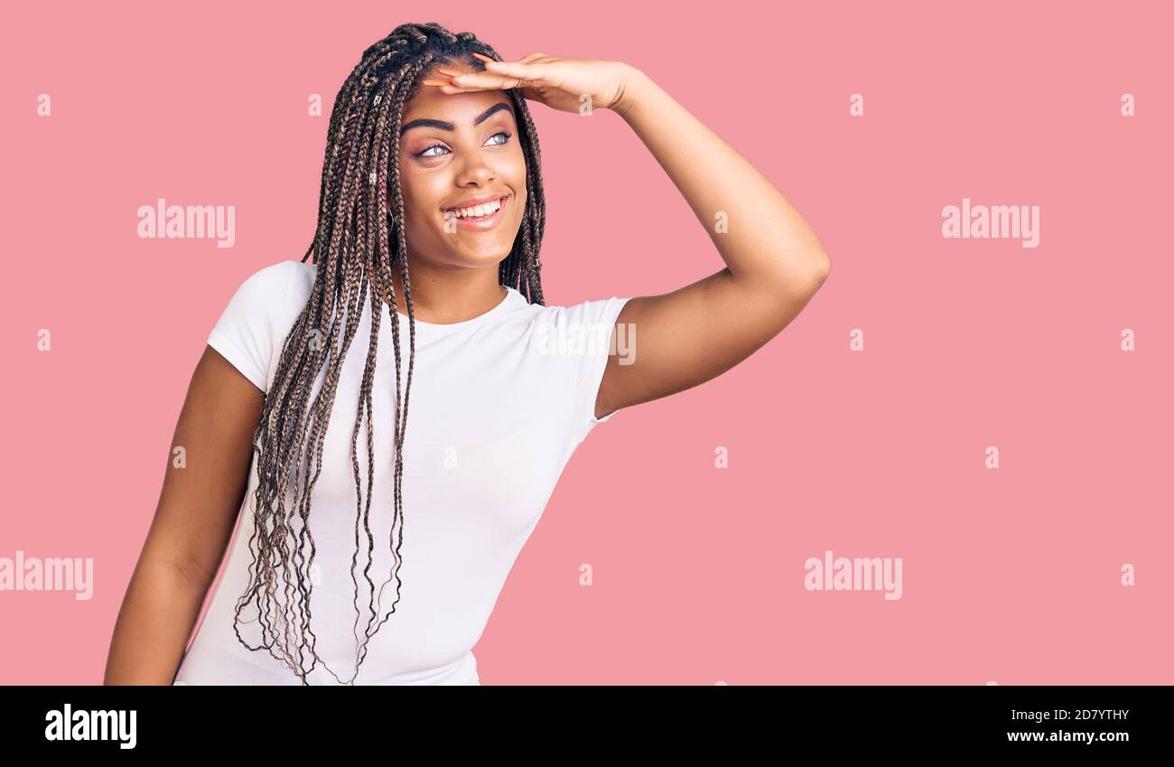 Young african american woman with braids wearing casual clothes very ...