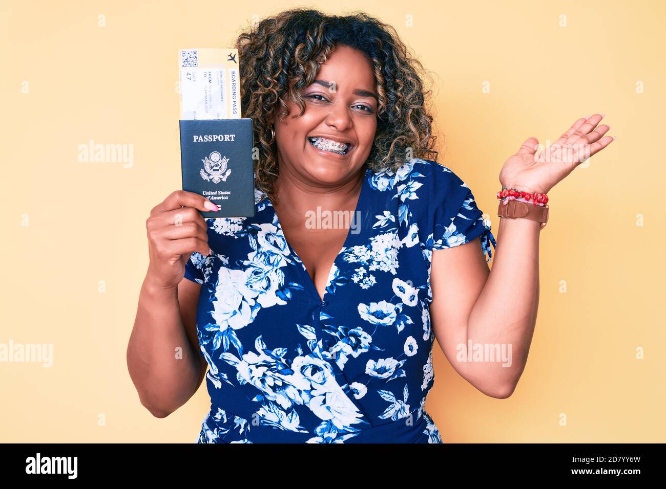 Black african hands holding ticket hi-res stock photography and images ...