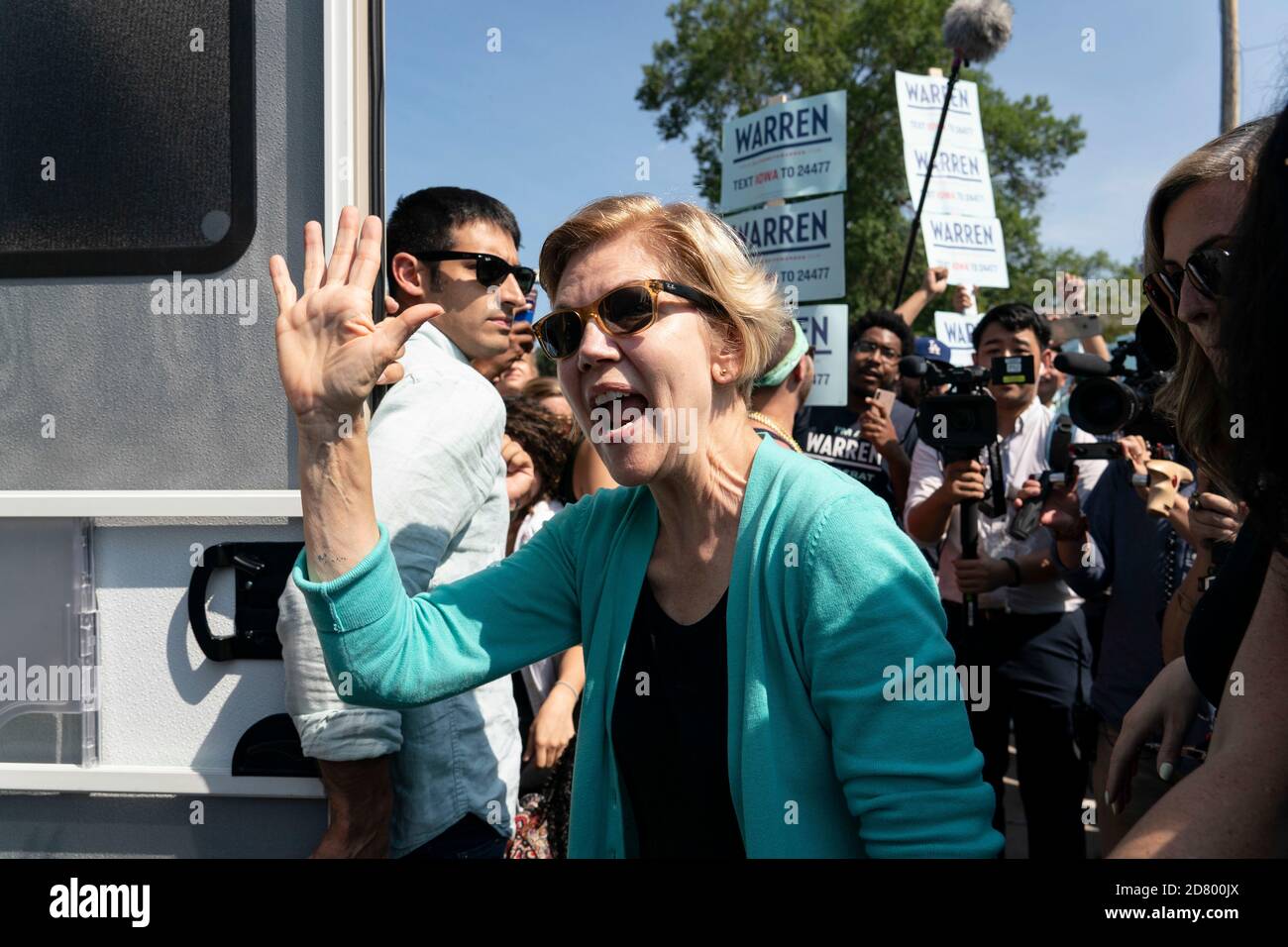 2020 Democratic hopeful Senator Elizabeth Warren, a Democrat from Massachusetts, greets supporters at a rally outside the building where the Wing Ding Dinner will take place on August 9, 2019 in Clear Lake, Iowa. The dinner has become a must attend for Democratic presidential hopefuls ahead of the of Iowa Caucus. Credit: Alex Edelman/The Photo Access Stock Photo