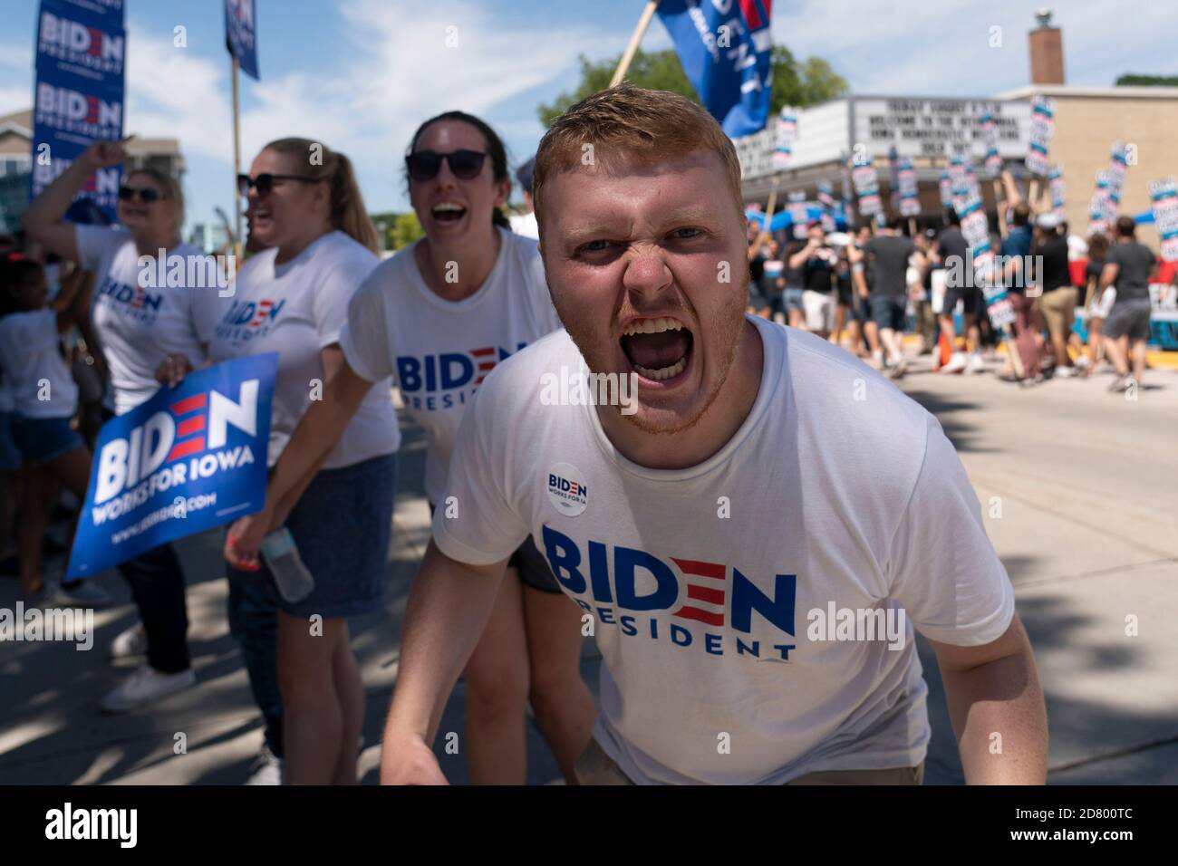 Supporters  of 2020 Democratic hopeful former Vice President Joe Biden rally outside the building where the Wing Ding Dinner will take place on August 9, 2019 in Clear Lake, Iowa. The dinner has become a must attend for Democratic presidential hopefuls ahead of the of Iowa Caucus. Credit: Alex Edelman/The Photo Access Stock Photo