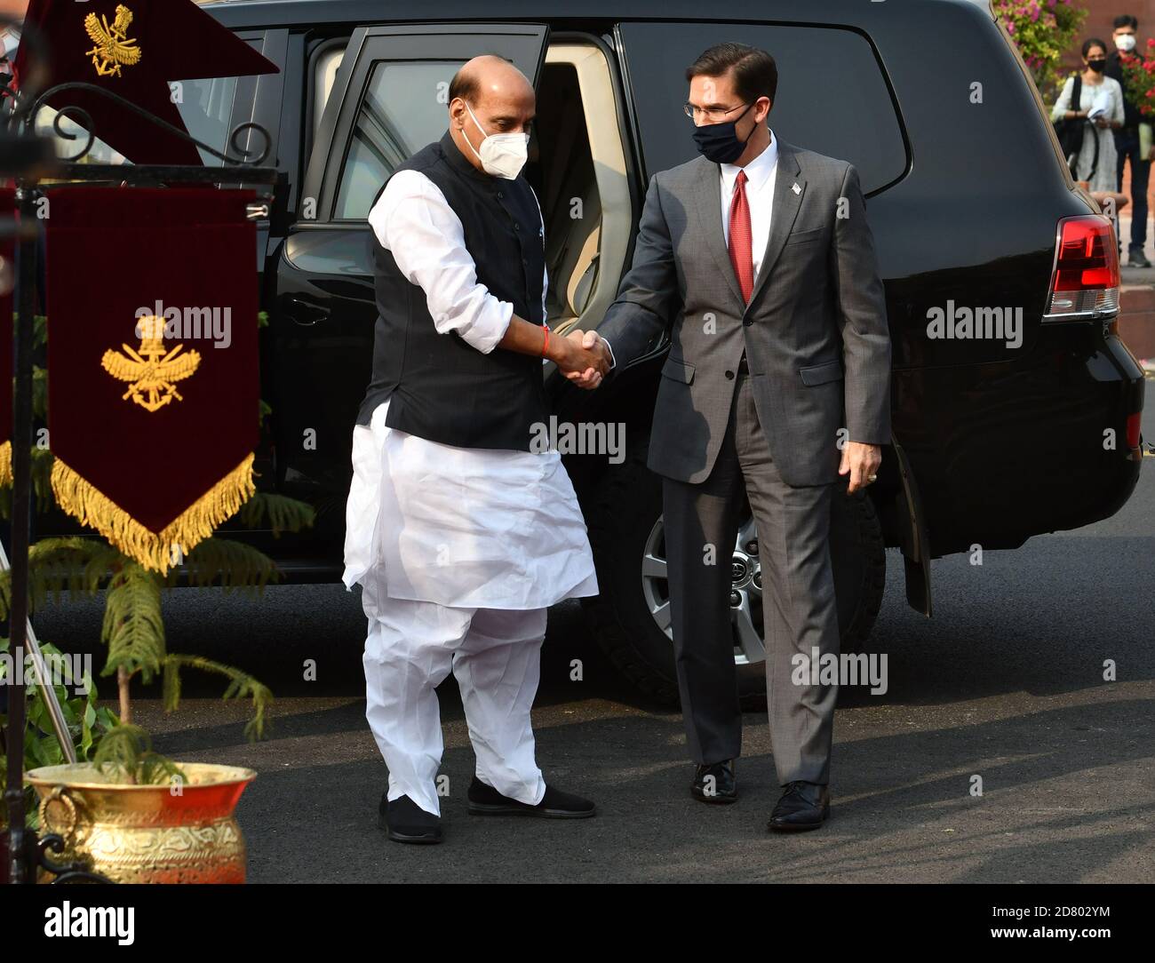 U.S. Defense Secretary Mark Esper, right, is welcomed by his Indian counterpart Rajnath Singh as he arrives at the Defense Ministry for a ceremonial guard of honor in New Delhi, India, Monday, Oct. 26, 2020. Photograph: Sondeep Shankar Stock Photo