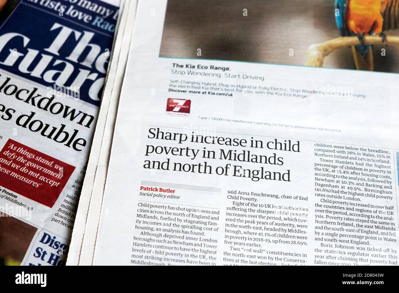 'Sharp increase in child poverty in Midlands and north of England' Guardian newspaper headline article on 14 October 2020 London England UK Stock Photo