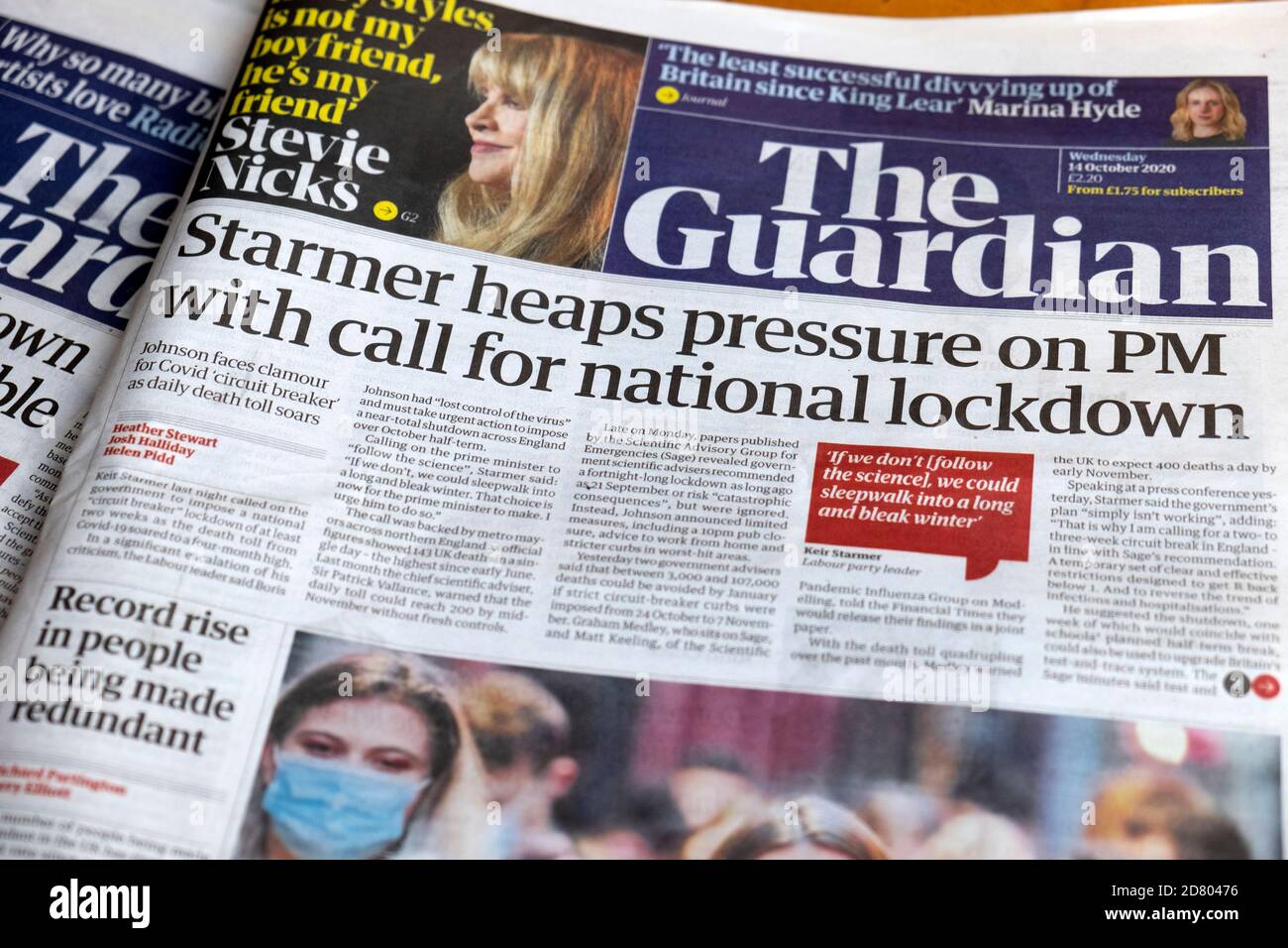 Keir 'Starmer heaps pressure on PM with call for national lockdown' front page article Guardian newspaper headline on14 October 2020 in London UK Stock Photo