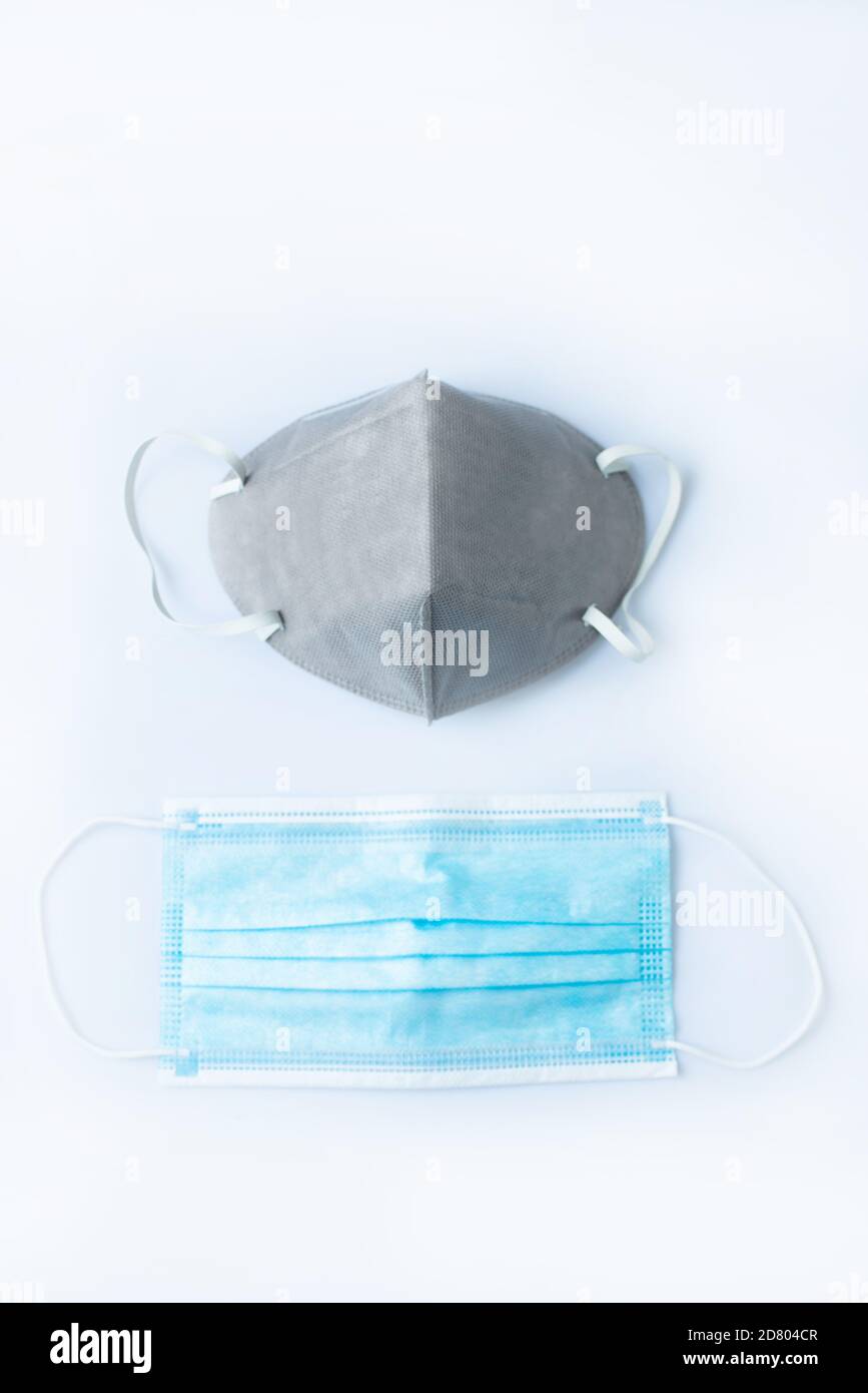 Close-up of a grey N95 mask and surgical mask Stock Photo