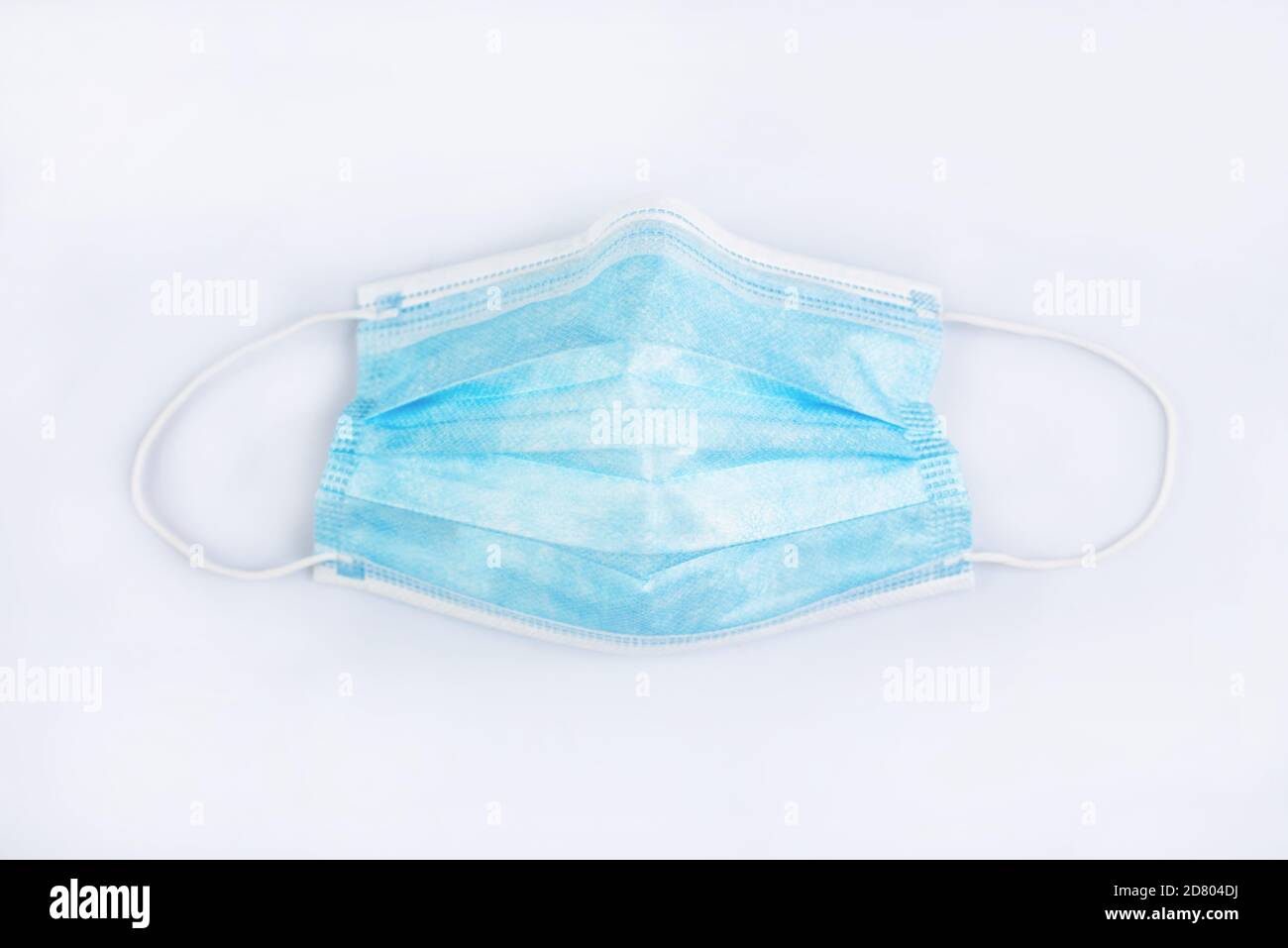 Close-up surgical mask isolated on white background Stock Photo - Alamy
