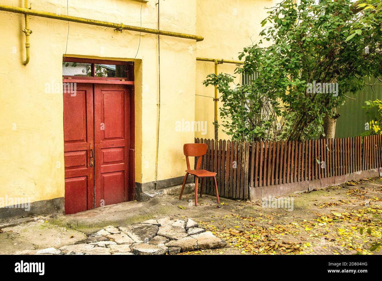 image of the fence of the front garden in the courtyard of the old city courtyard near the house Stock Photo