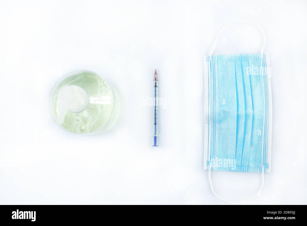 Medical masks, syringes and disinfectants are isolated on a white background Stock Photo