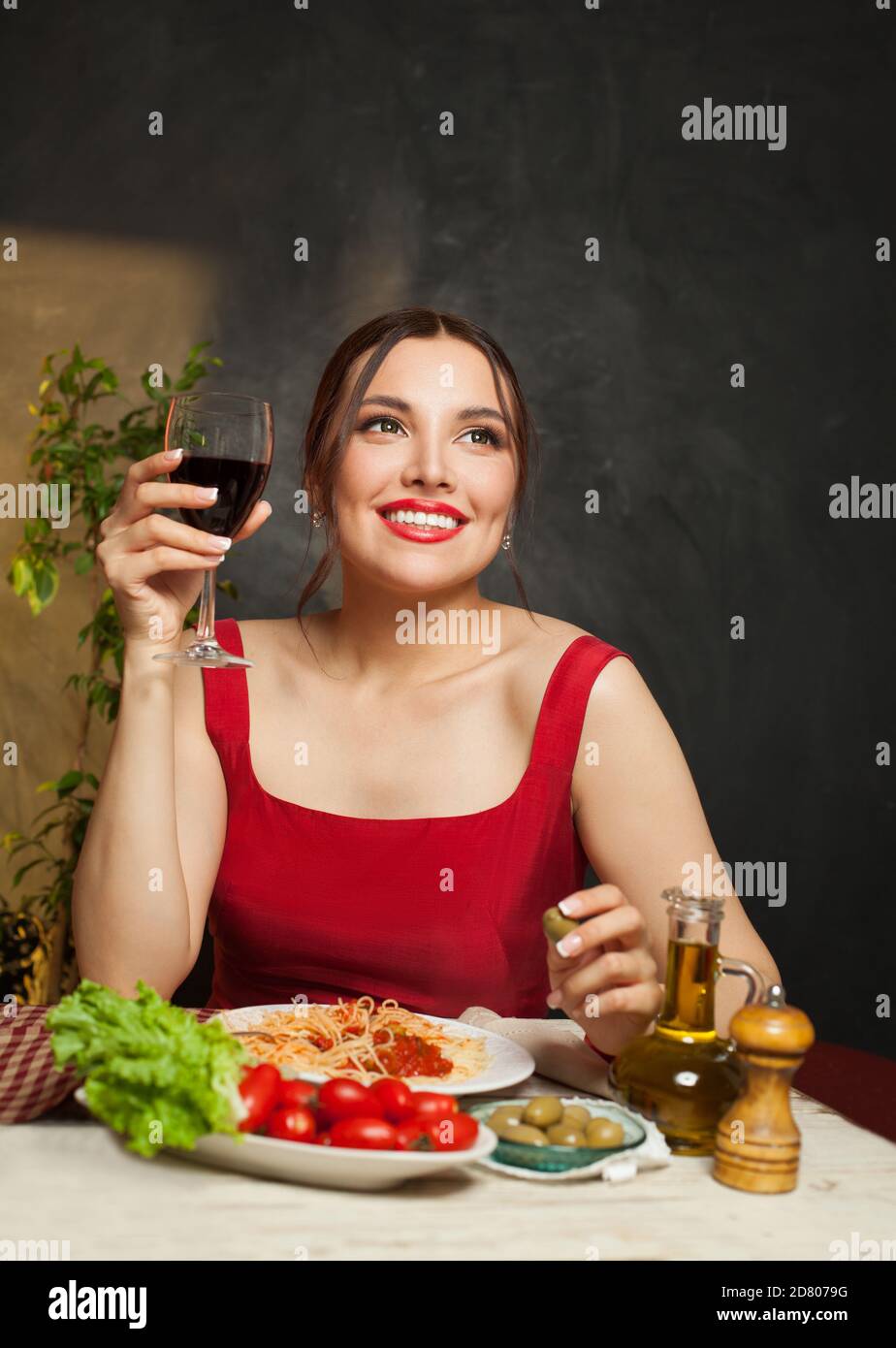 Woman eating pasta in Italy restaurant Stock Photo Alamy