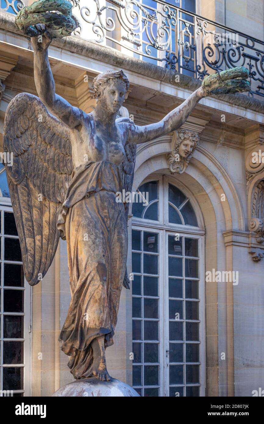 The Victory Allegorical Statue inside courtyard of Hotel Carnavalet - now the Museum of French History, les Marais, Paris, France Stock Photo