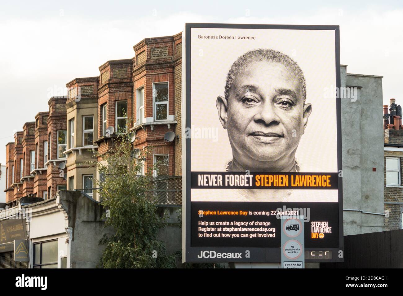 Baroness Doreen Lawrence and a Never Forget Stephen Lawrence electronic billboard in Wandsworth, southwest London, UK Stock Photo