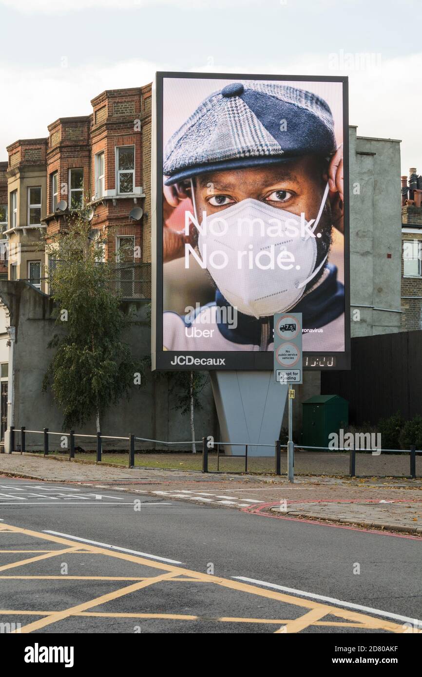 Uber - No Mask, No Ride advert in Wandsworth, southwest London, UK Stock Photo
