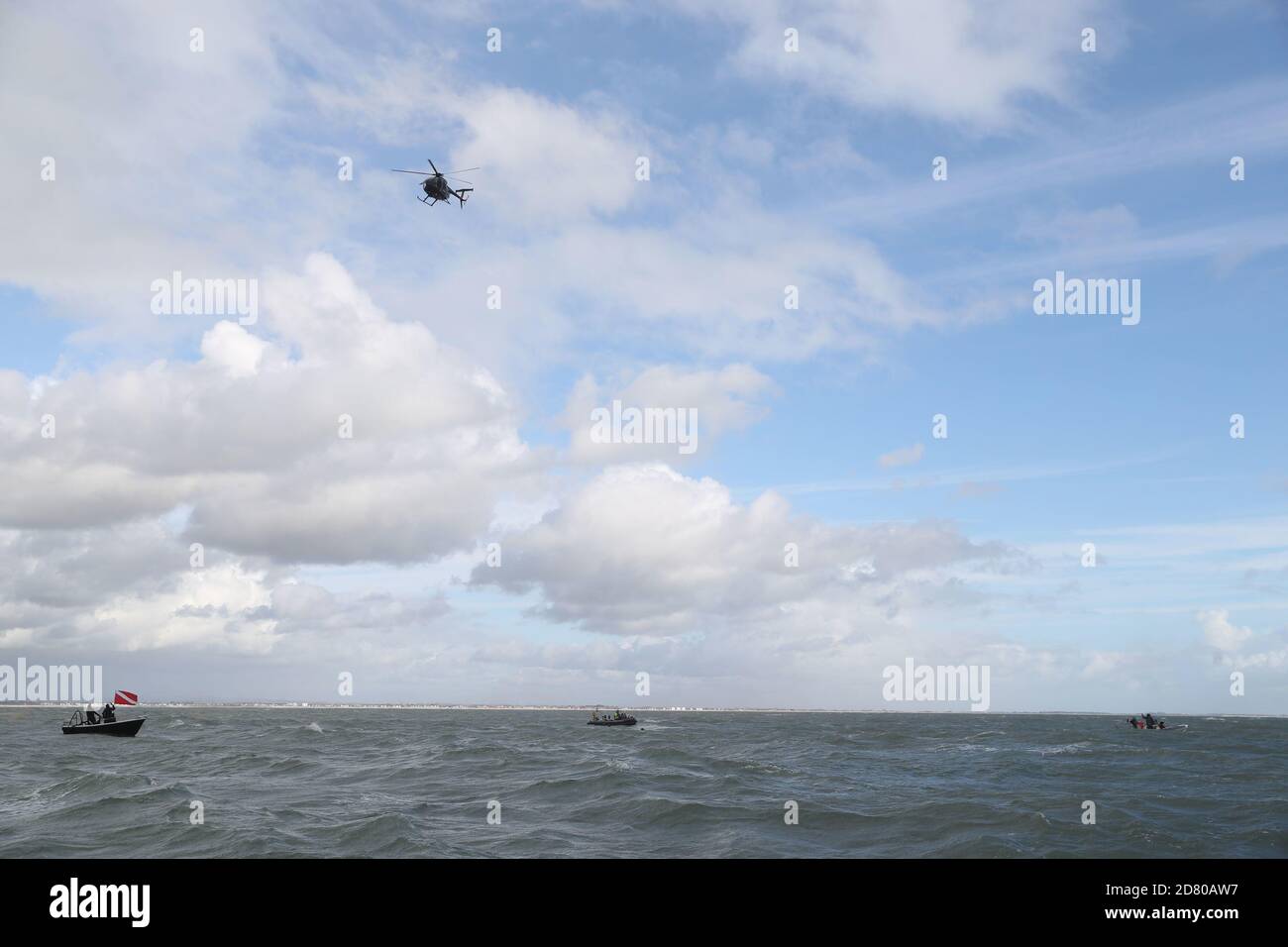 RETRANSMITTING Amending distance achieved on jump to 40m. Former paratrooper John Bream attempts a record for highest jump without a parachute by jumping 40m from a helicopter into the sea off Hayling Island in Hampshire. Stock Photo