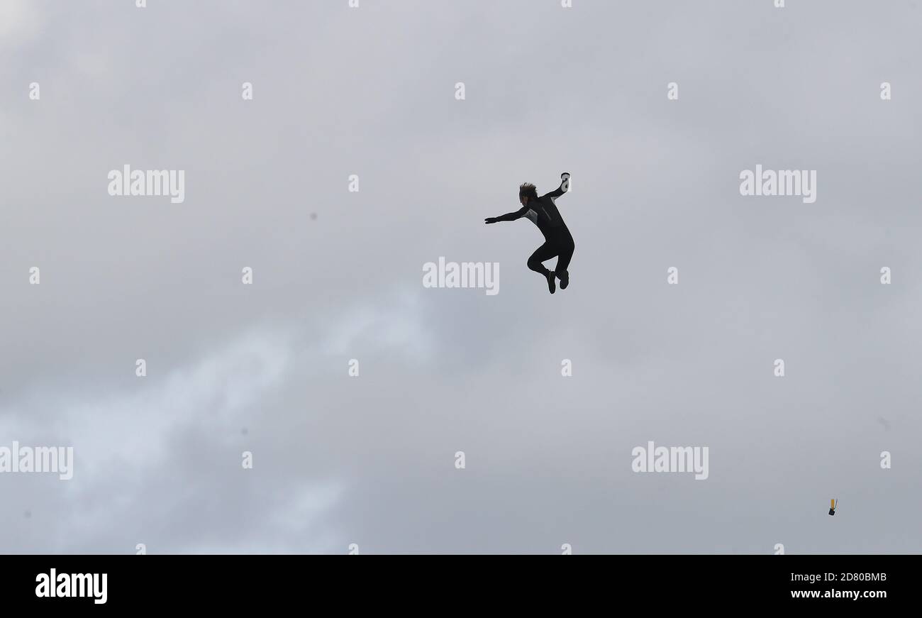 Former paratrooper John Bream jumps from a helicopter as he attempts to set the record for