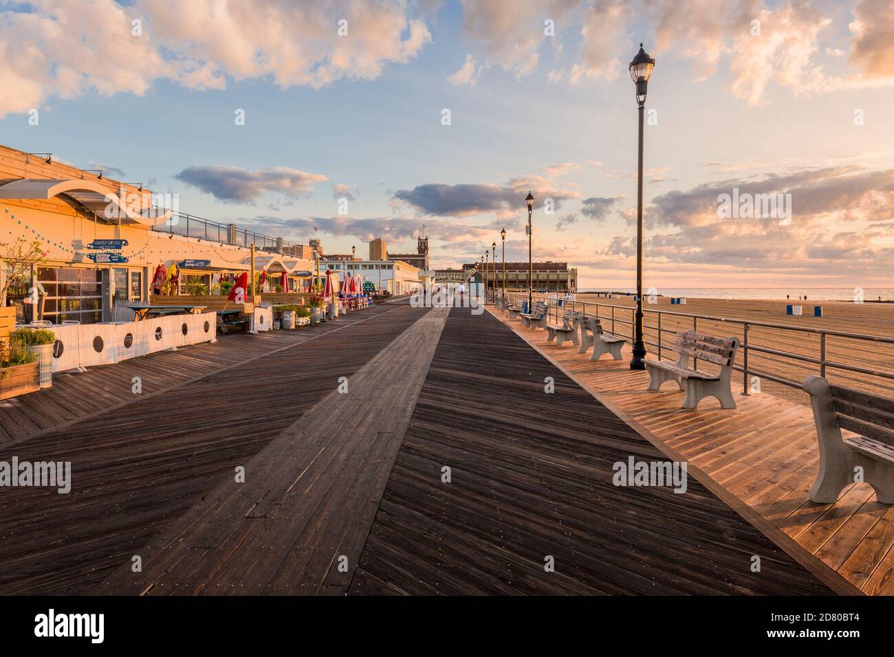 The boardwalk in Asbury Park with morning sun and shadows Stock Photo