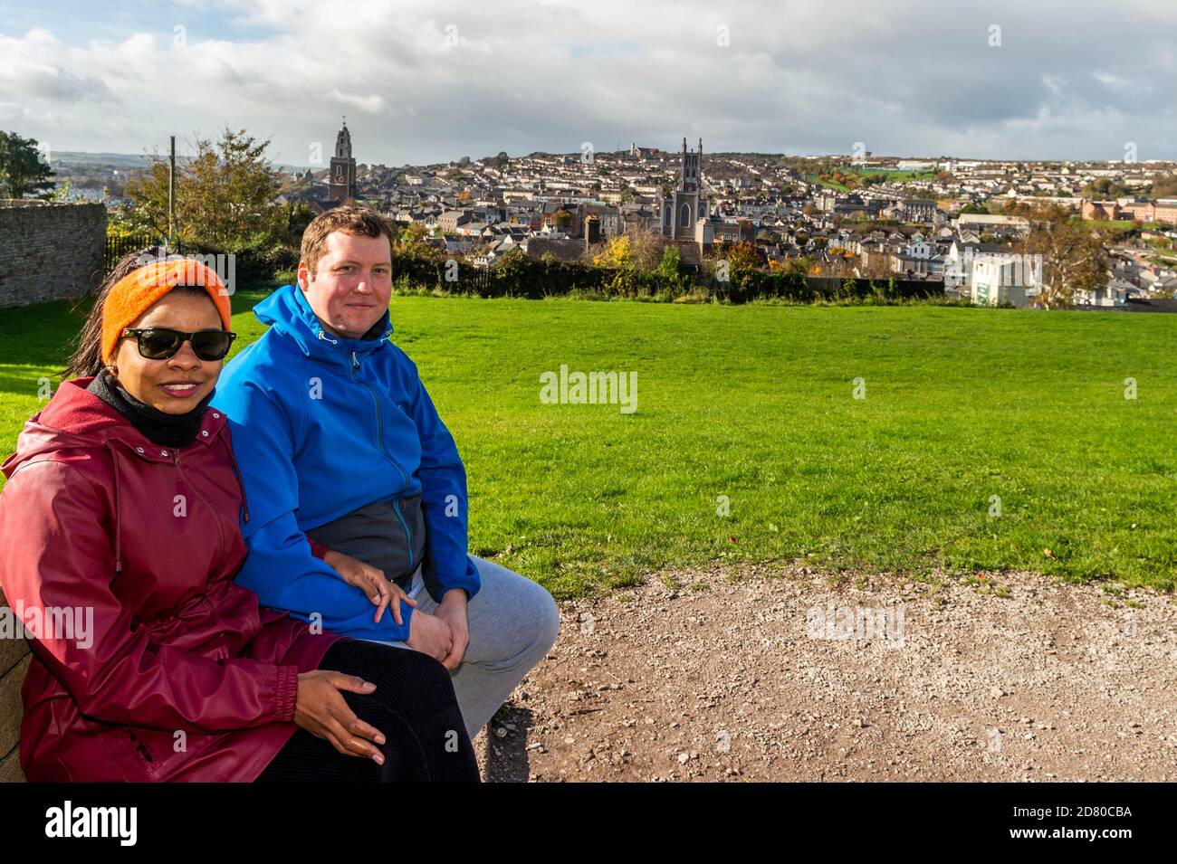 Cork, Ireland. 26th Oct, 2020. Many people took advantage of the good Bank Holiday weather in Cork today. Bell's Field overlooking Cork was very popular. Enjoying the view and good weather were Luana Cruz and Rafel Pietrzyk from Cork. Credit: AG News/Alamy Live News Stock Photo