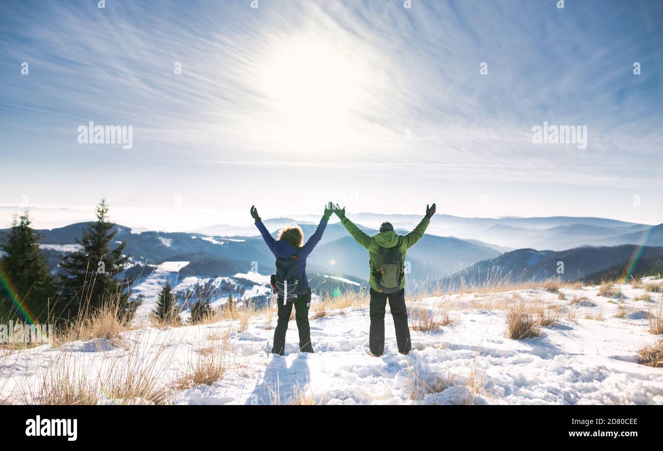Rear view hiker stretching hi-res stock photography and images - Alamy