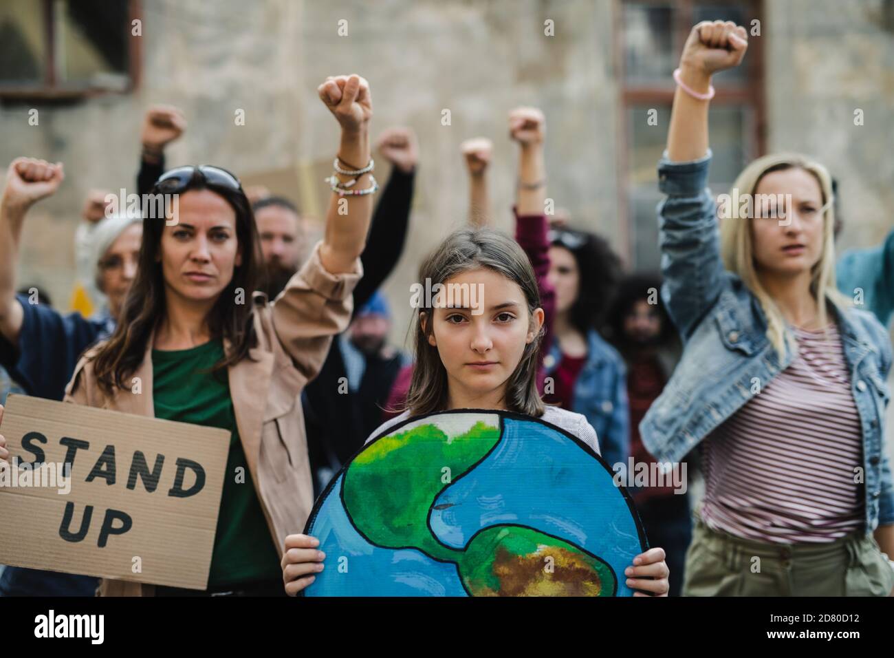 Activist Protesting Group of people activists protesting on streets, strike and ...