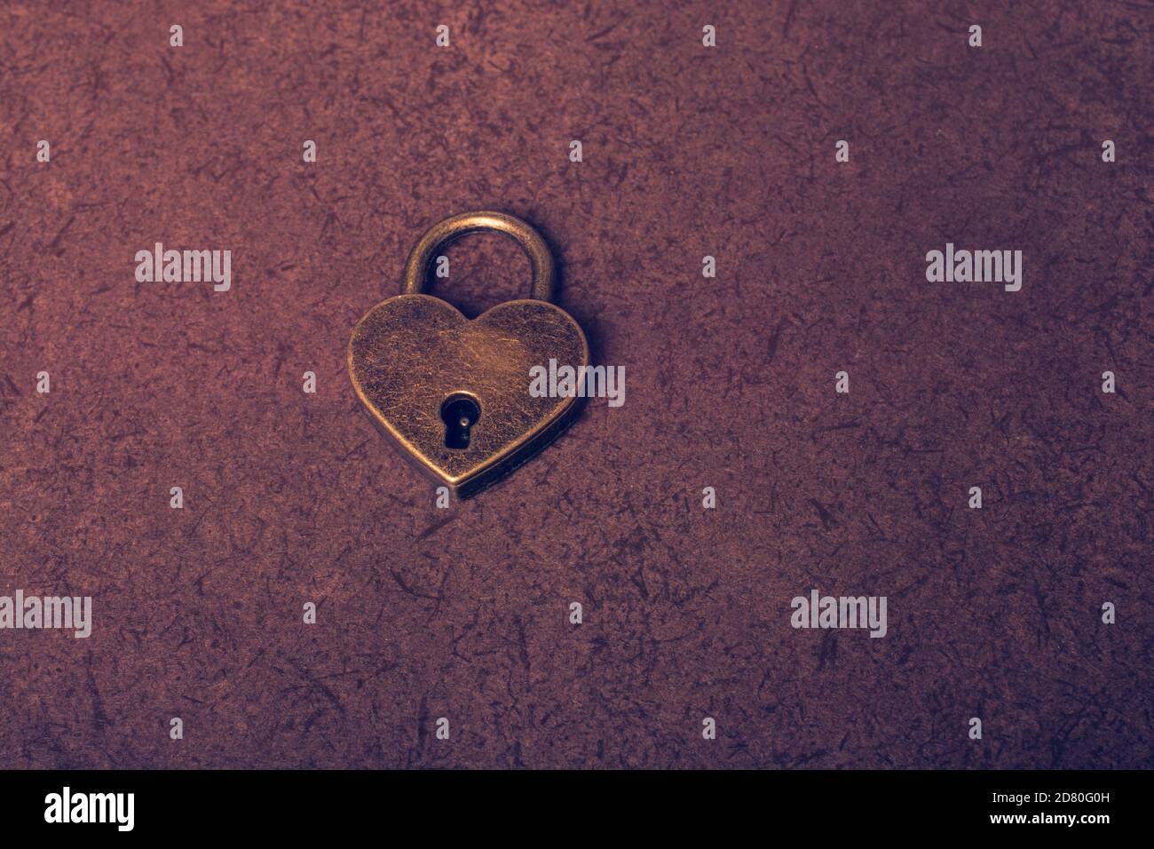 Metal padlock in heart shape as symbol of love Stock Photo - Alamy