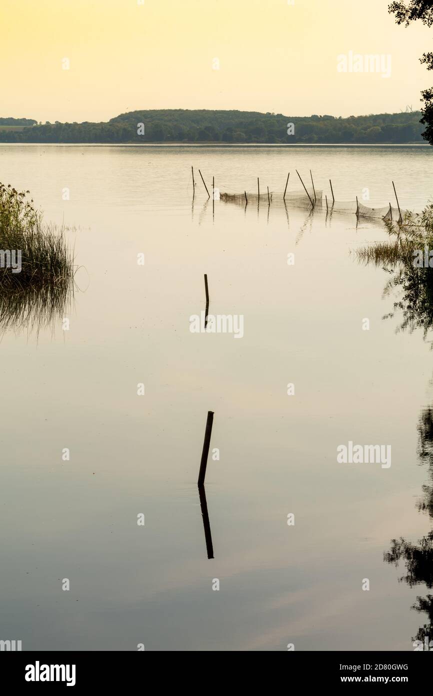 Beautiful sunset scenery of a fishing net in a lake one of the latest ...