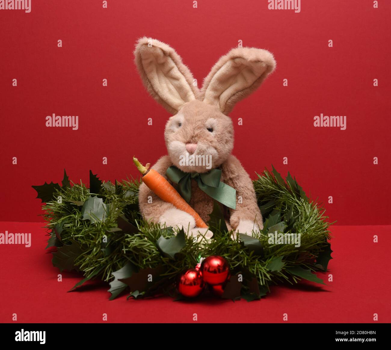 Christmas Toy Bunny with a carrot Stock Photo